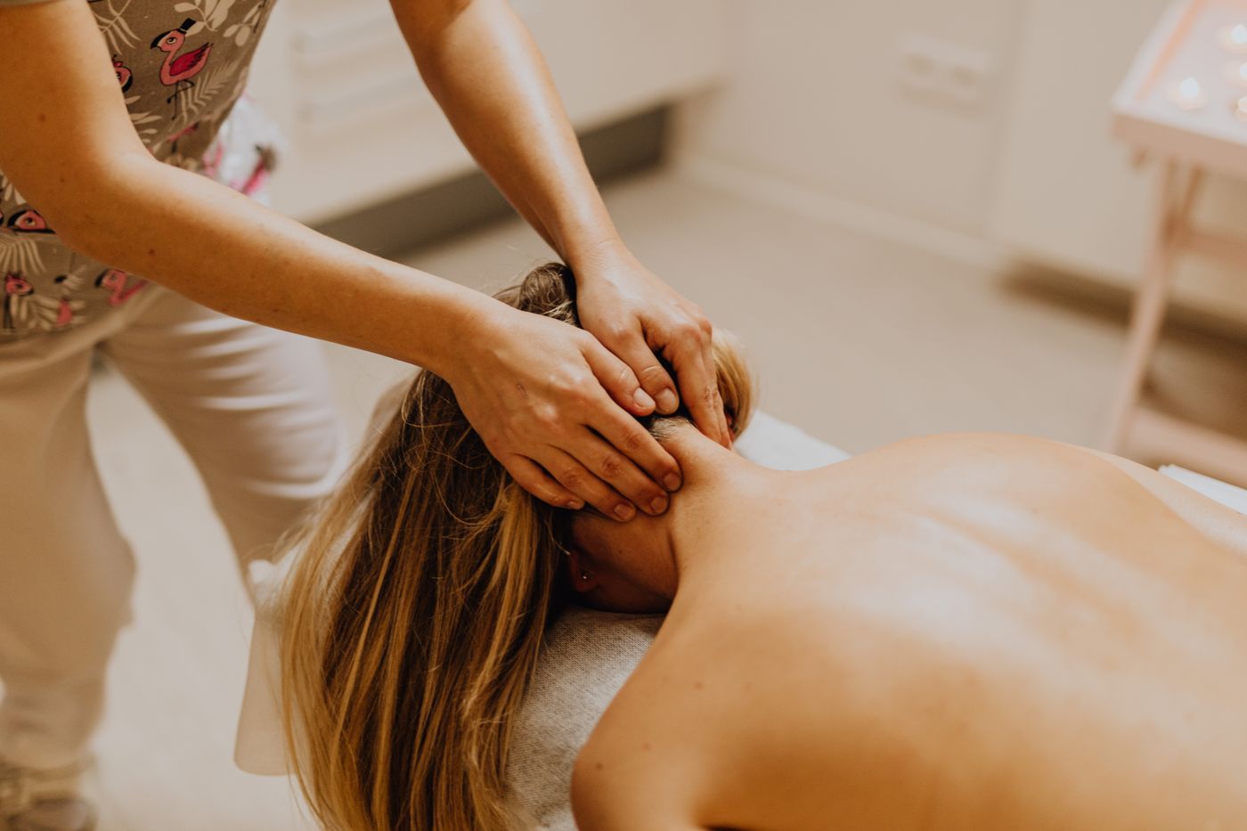 Deep tissue massage, focused pressure on the shoulder