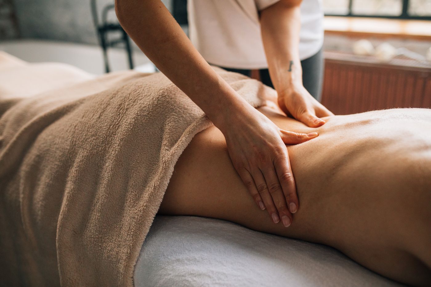 Swedish massage, long flowing strokes